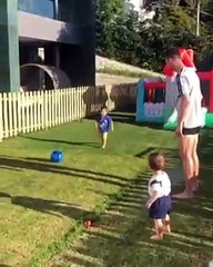 Cristiano Ronaldo playing football with kids