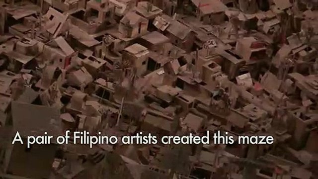 Intricate cardboard city rises in Manila art show