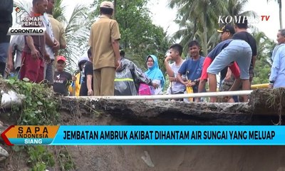 Jembatan Ambruk Akibat Dihantam Air Sungai yang Meluap