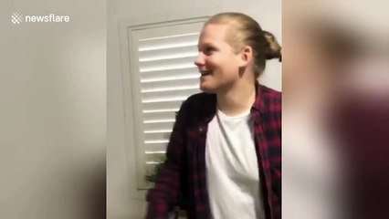 Canadian man armed with cooking tongs needs Aussie friend to remove critter