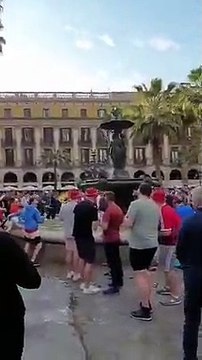 Liverpool fans pushing Barcelona locals into fountains & racially abusing them