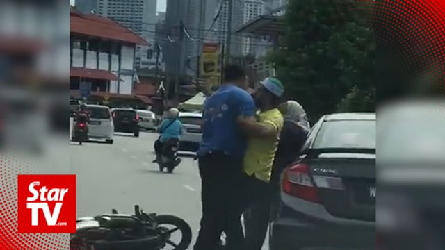 Cops looking for man who slapped, punched woman in viral video