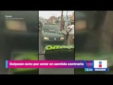 Golpean con machete un auto en Ecatepec ¡por estar en sentido contrario! | Yuriria Sierra