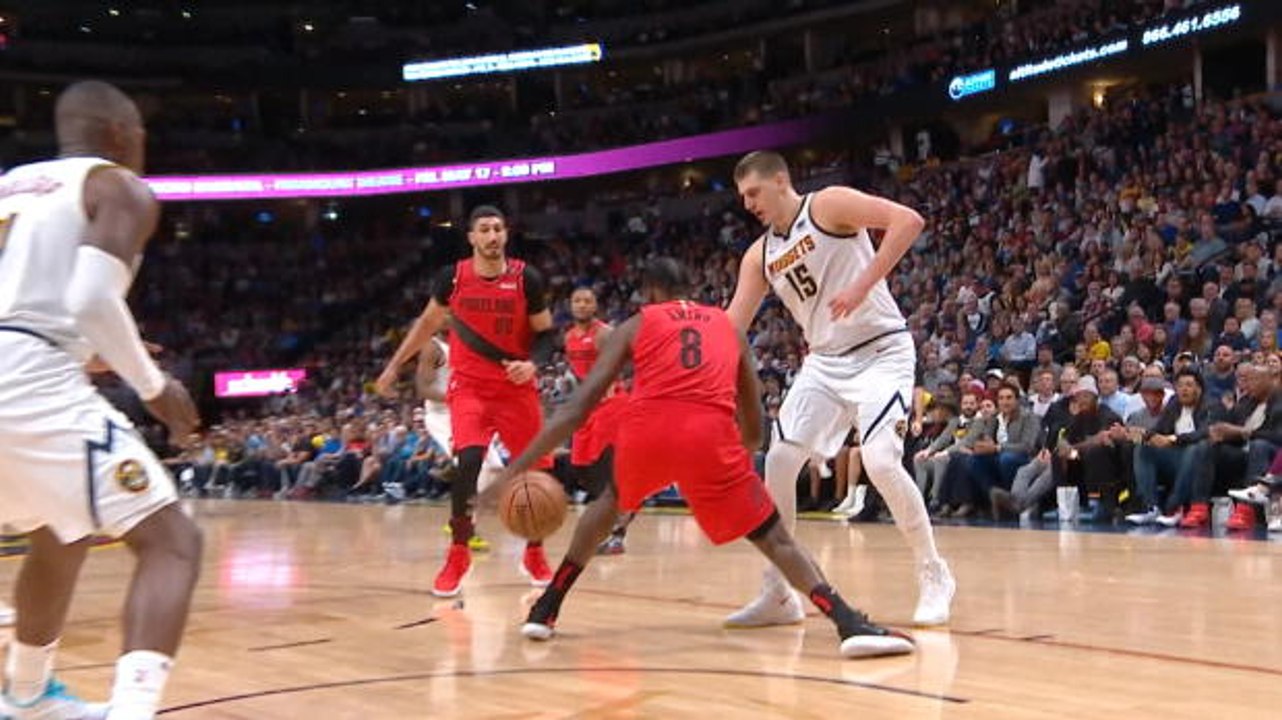 Jokic with clever nutmeg assist
