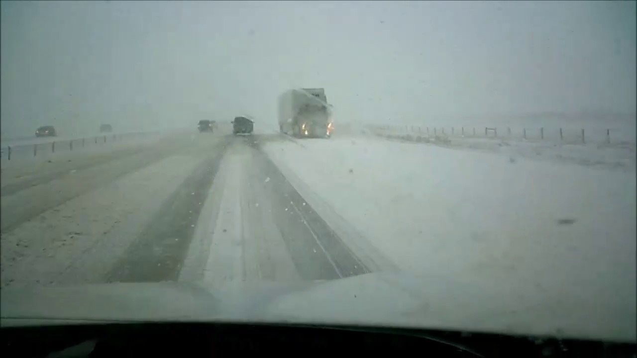 MCH 77 SEMI COMING RIGHT AT US ON HYWAY GOING WRONG WAY WINTER STORM CALGARY ALBERTA CANADA MAY 27 2019