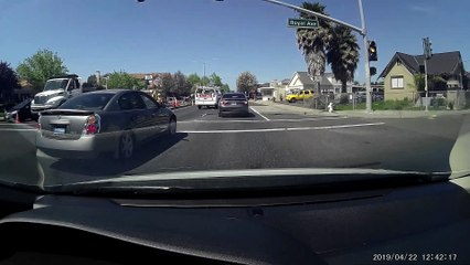 Driver Snatches Something and Darts Off