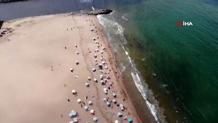 Nemden bunalan İstanbulluların akın ettiği Riva Plajı havadan görüntülendi- Vatandaşlar denizin...