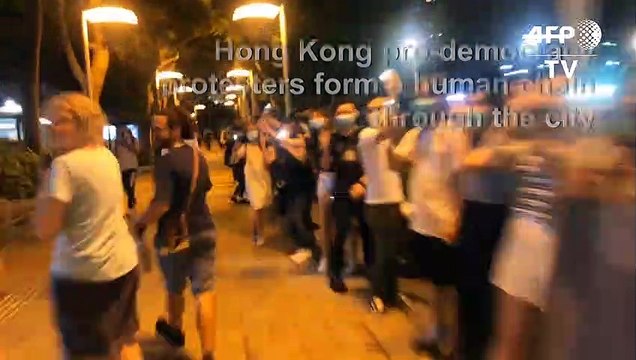 Hong Kong pro-democracy protesters form human chain