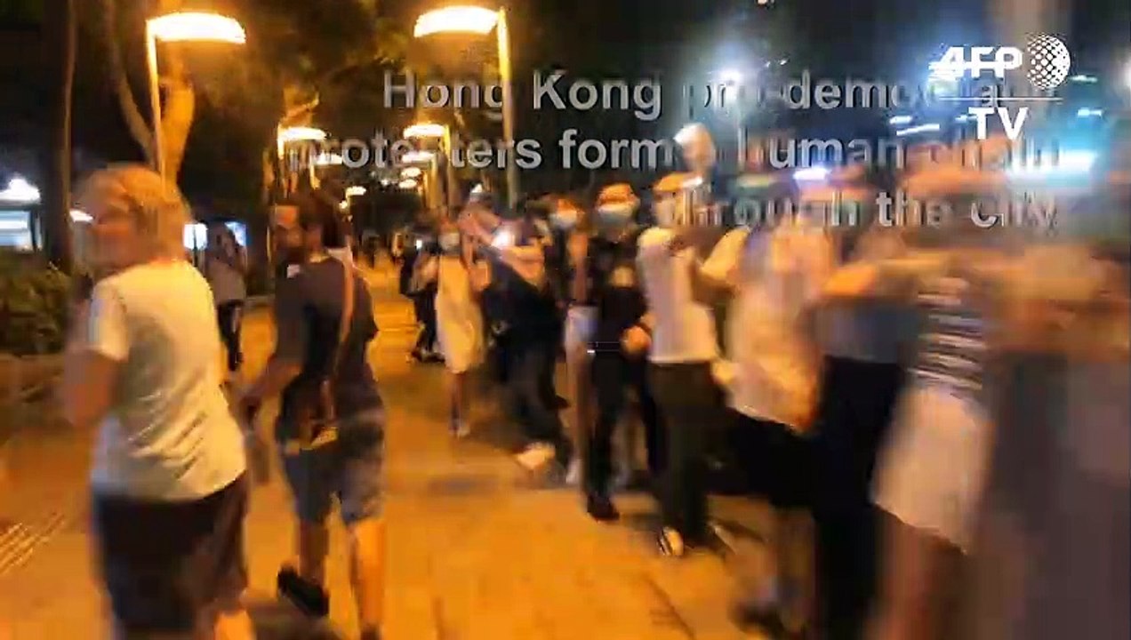 Hong Kong pro-democracy protesters form human chain