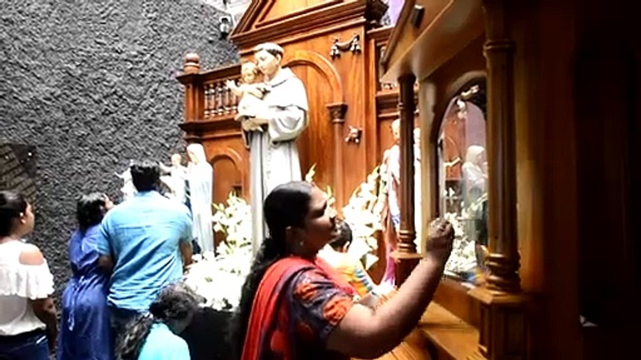 Sri Lanka's bombed church partially opens for prayers