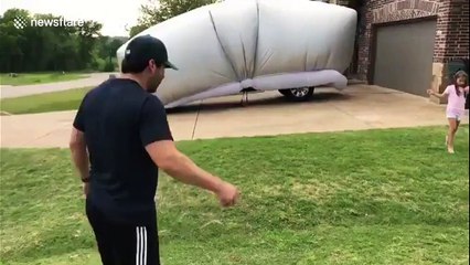 Texas man throws baseball at car 'tent' to prove it's hail-proof