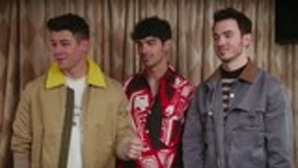 Kate McKinnon Enlists Jonas Brothers to Replace Broken Record Player in 'SNL' Promo | Billboard News