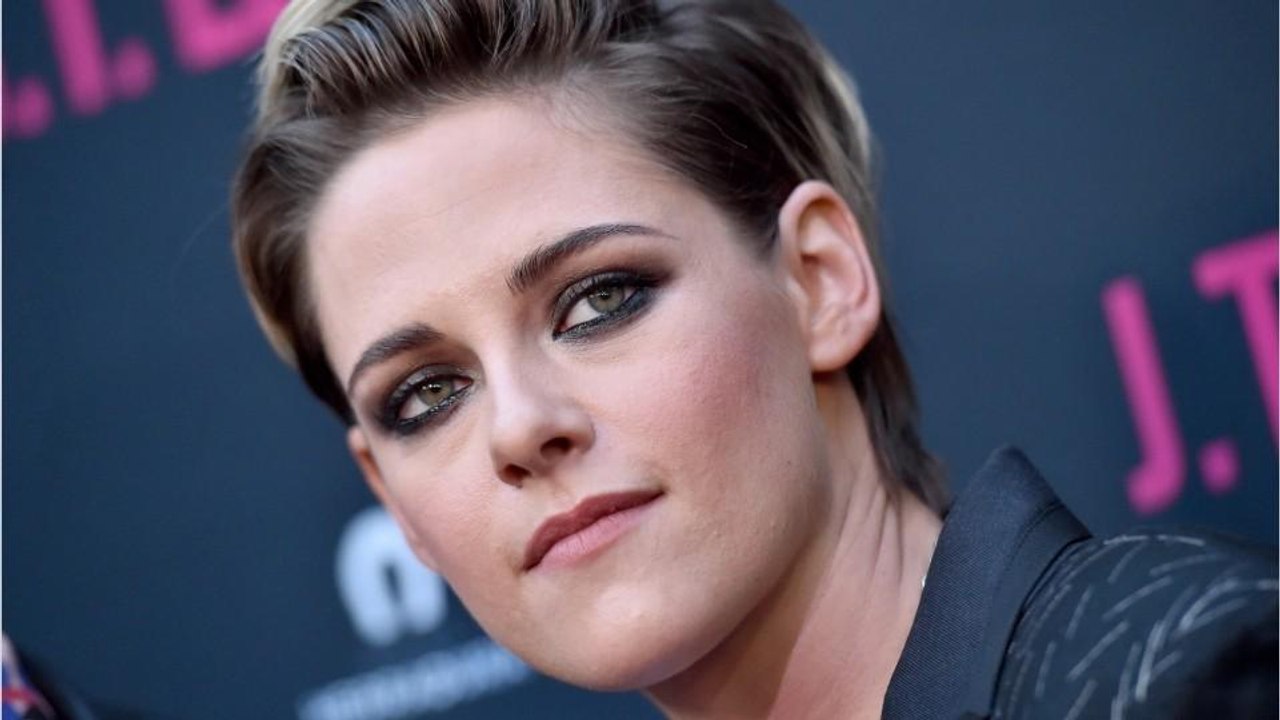 Kristen Stewart says she felt a "huge responsibility" to come out as gay or straight—and explained why she wishes she didn't
