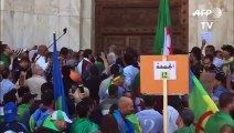 الجزائريون يتظاهرون في يوم الجمعة الثاني عشر على التوالي