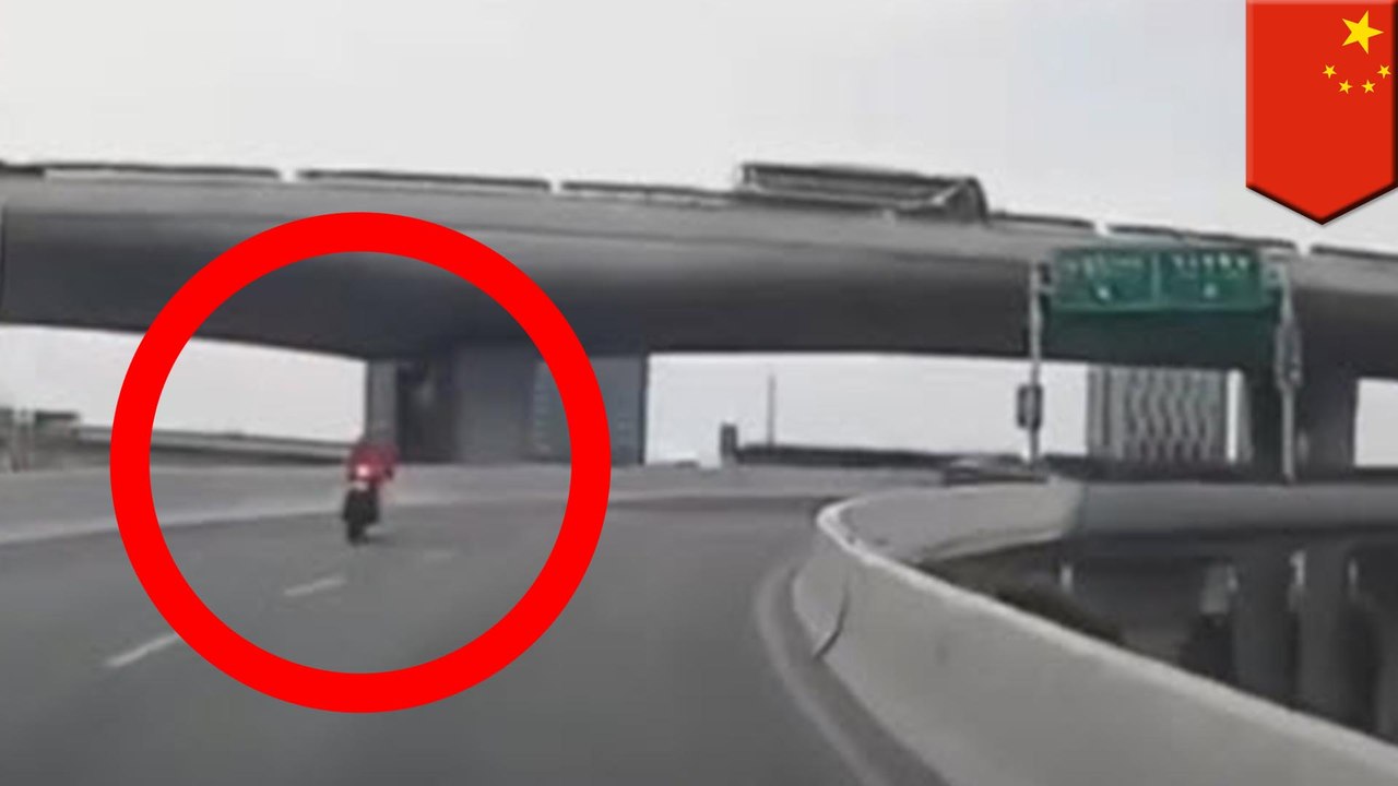 Motorcyclist dies after plunging over Shanghai...