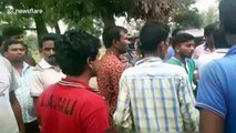 Violence erupts at polling station during general election in India