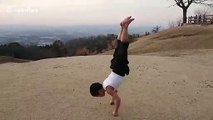 Young 'Bruce Lee' kid shows off amazing training with vertical pushups