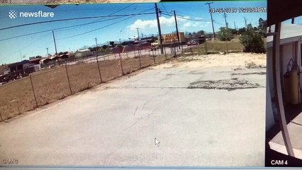 US driver fleeing police smashes through a business' fence to take a shortcut