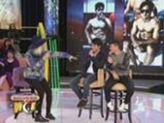 Vice touches the sexy abs of Marlon