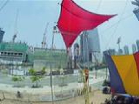 Kim accepts the trapeze flying challenge