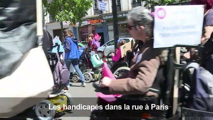 Déçus par Macron, les handicapés manifestent à Paris