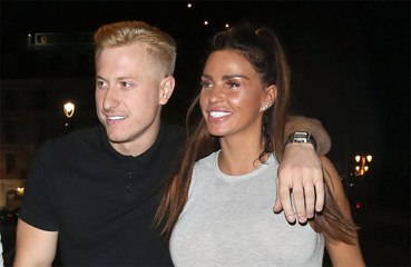 Katie Price's boyfriend removes her stitches