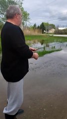 Catching a Carp in Your Flooded Driveway
