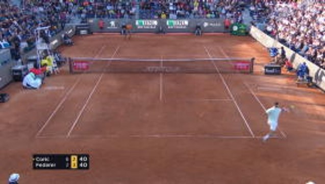 Federer saves two match points before battling past Coric