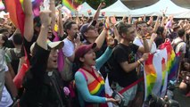 LGBT supporters react after Taiwan approves same-sex marriage
