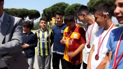 Bu okuldaki öğrencilerin yarısı lisanslı sporcu