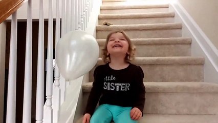 Genevieve Playing with a Balloon