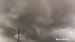 Insane wall cloud rotates above Reed Timmer in tornado-warned storm