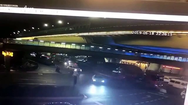 Car luckily escapes being flattened after lorry brings down footbridge in China