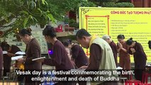 Hundreds gather at giant Buddha statue in Vietnam for Vesak day