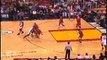 Dwyane Wade split two Bulls and explode to the basket for th