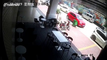 Wall collapses and damages 13 parked cars in China's Guangdong