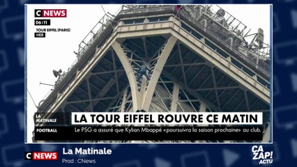 Un homme suspendu à la tour Eiffel pendant  6 heures