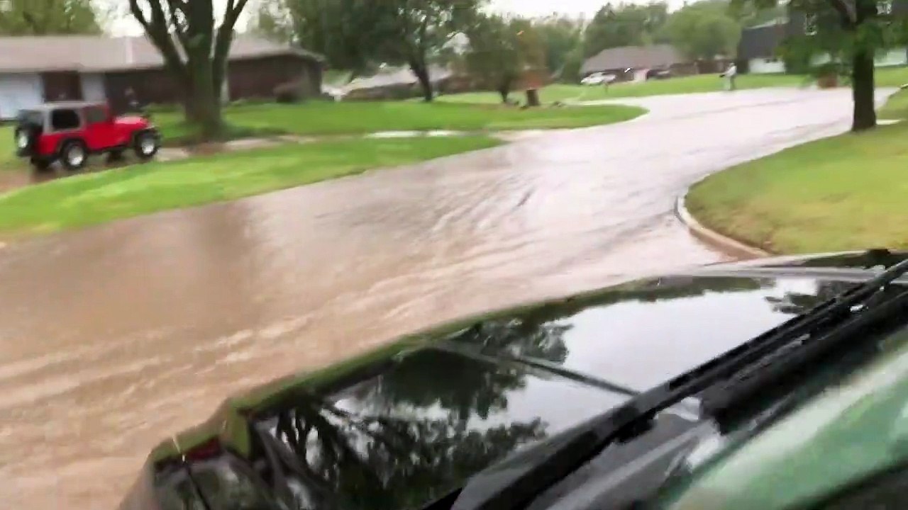 Kids Canoeing Down the Street