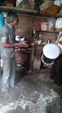 celebration with man working with drummer for the song but not quite working perfectly...do I drum while you sing? fun!