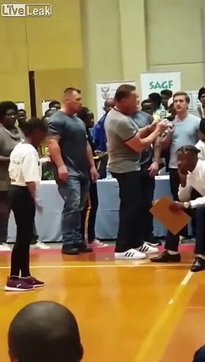 Different angle of Arnold Schwarzenegger getting kicked in the back