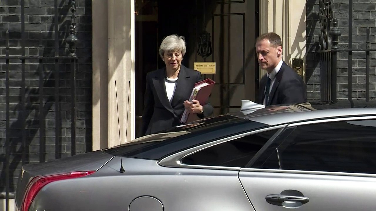 Theresa May departs Downing Street for PMQs
