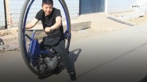الصين: شاب يخترع دراجة بعجلة واحدة !!!