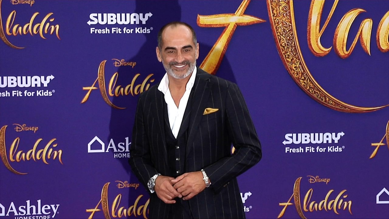 Navid Negahban "Aladdin" World Premiere Purple Carpet