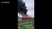 Fire breaks out at industrial site in Tottenham creating huge plumes of black smoke