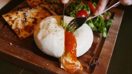This Burrata Is Stuffed With Pizza Sauce And Even More Cheese