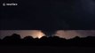 Terrifying night-tornado illuminated by streaks of lightning in Oklahoma, USA