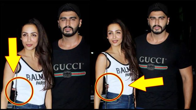 Arjun Kapoor keeps hand on Malaika Arora's back at India's most wanted screening | FilmiBeat