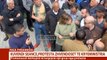 Report TV - Protesta e opozitës/ Përplasen fizikisht një burrë dhe një grua