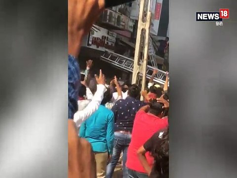 सूरत में आग, जान बचाने के लिए कूदे बच्चे, 18 की मौत