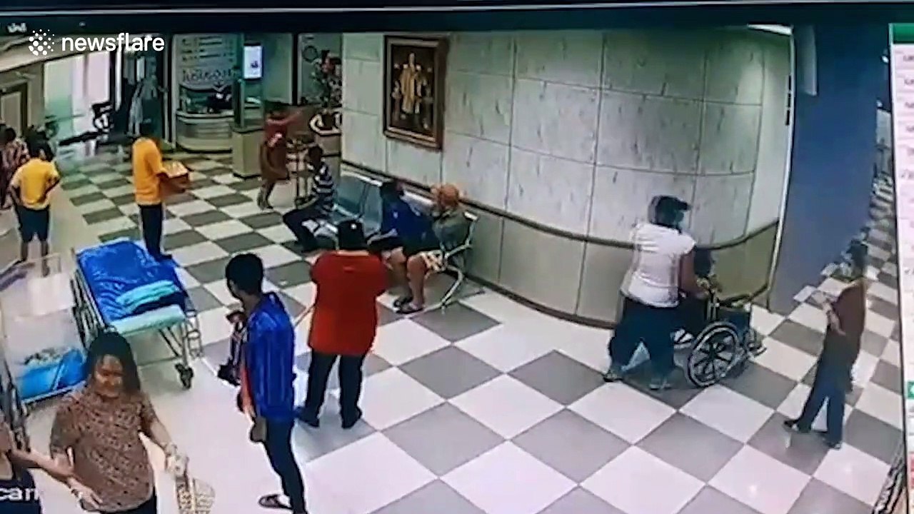 Hospital patients run for cover as storm tears through waiting room in Thailand
